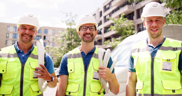 istock Mobile Vehicle Maintenance: Smiling Technicians Providing Professional Services 2159561998