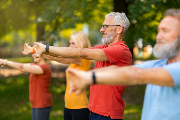istock Senior adults participate in stretching exercise, extending their arms forward 2159563454
