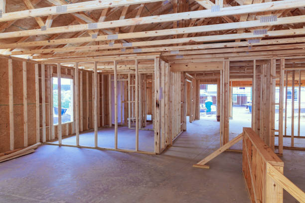 istock An unfinished residential home under construction with wood framing a beam supporting it 2159563656
