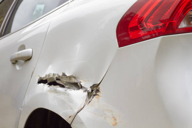 istock Rear of a damaged white car 2159565471