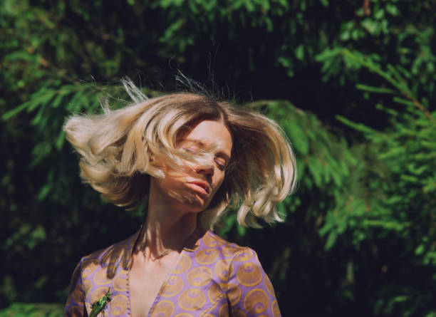 young beautiful woman in action at nature