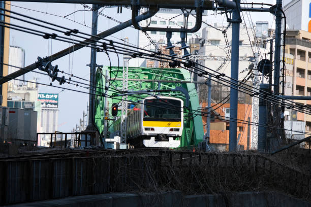 Metro train riding in Chiyoda Ward, Tokyo, Japan.