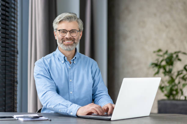 istock A Professional is Smiling While Working with a Laptop in a Modern Office Setting 2159567808