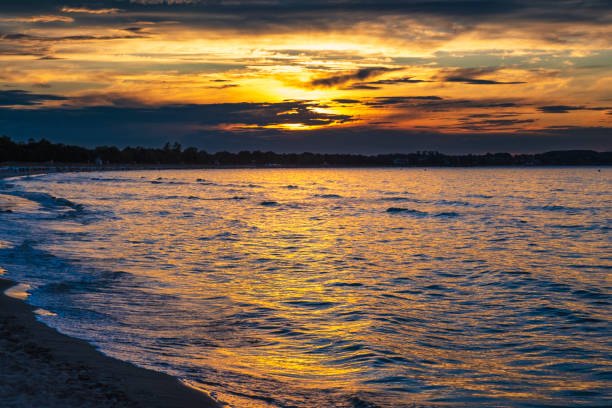 Colorful sunset on the beach of Boltenhagen on the Baltic Sea