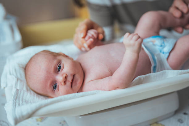 istock Caucasian Infant on Changing Station 2159568992