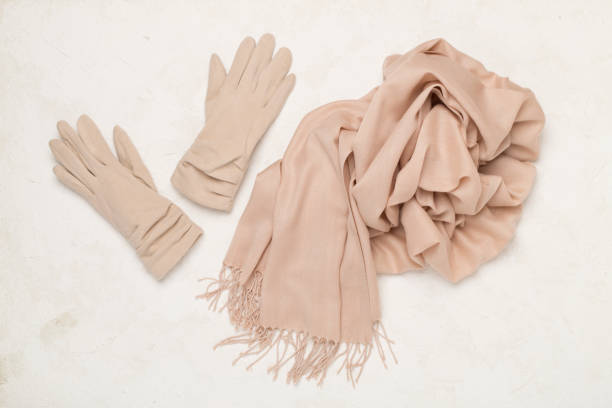 istock Stylish autumn accessories on concrete background, top view 2159570823