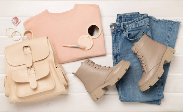 istock Flat lay with trendy spring outfit on wooden background, top view 2159570829