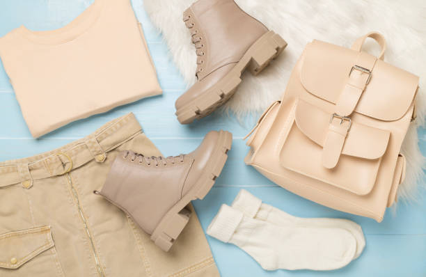 istock Flat lay with trendy spring outfit on wooden background, top view 2159570831
