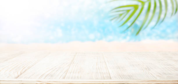 istock White table and bokeh calm blue seascape 2159572668