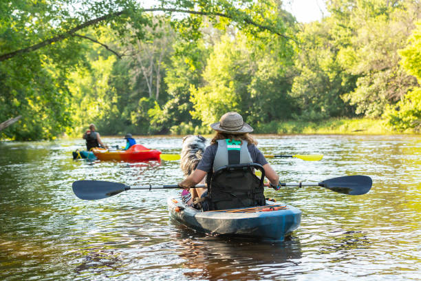 istock Family Kayaking on River on Summer Evening 2159574395