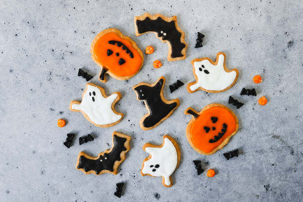 istock Freshly prepared Halloween gingerbread cookies in various festive shapes 2159580078