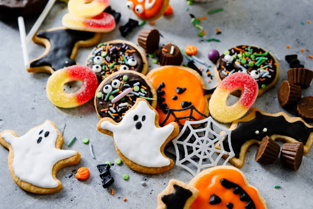 istock Halloween cookies and sweets on home kitchen table 2159581115