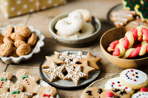 Christmas table scene of assorted sweets and cookies