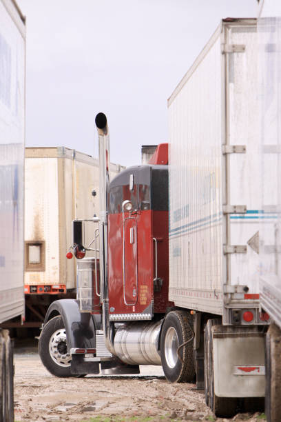 istock Semi truck backs up a trailer 2159581587