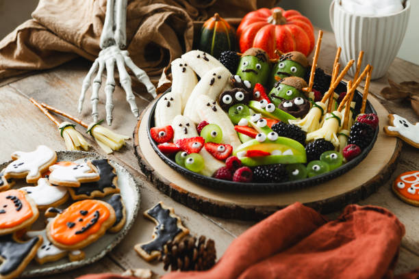 istock Holiday table with sweets for Halloween party 2159581665
