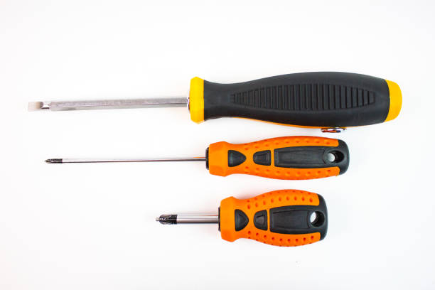 Screwdrivers on a white insulated background. Working tool, set of screwdrivers.