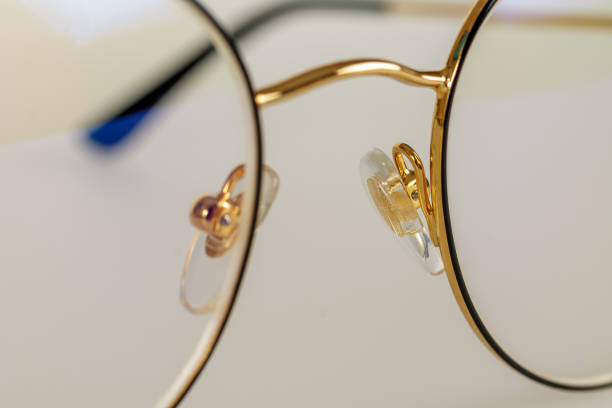 istock Metal-framed glasses. Glasses mounting system. Macro close-up. 2159583663