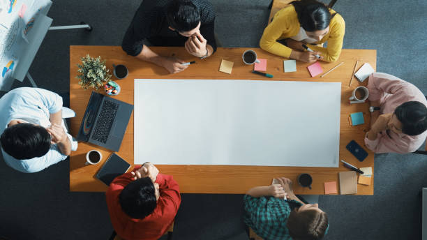 istock Top view of group walking at boardroom and brainstorming idea. Convocation. 2159585276