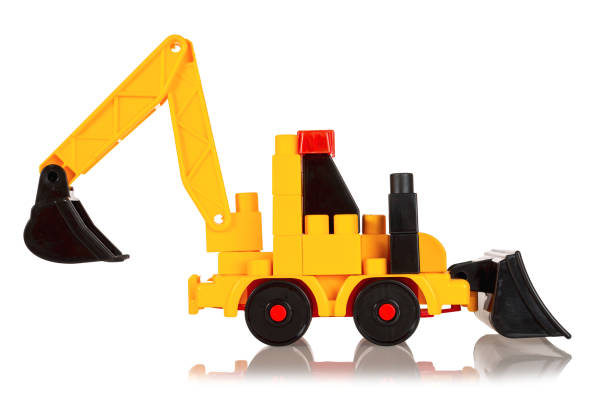 Toy constructor blocks for assembling a children's toy, excavator, tractor with bucket isolated on a white background