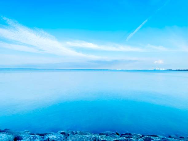 istock Natural view of blue sea with a blue sky background 2159585656