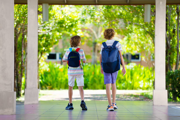 istock Child happy to be back to school. 2159588080