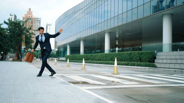 istock Successful business man celebrate increasing sales while standing. Exultant. 2159590049