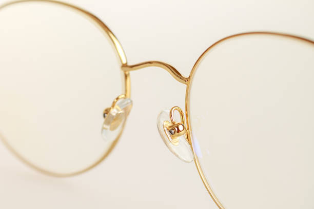 istock Metal-framed glasses. Glasses mounting system. Macro close 2159590948