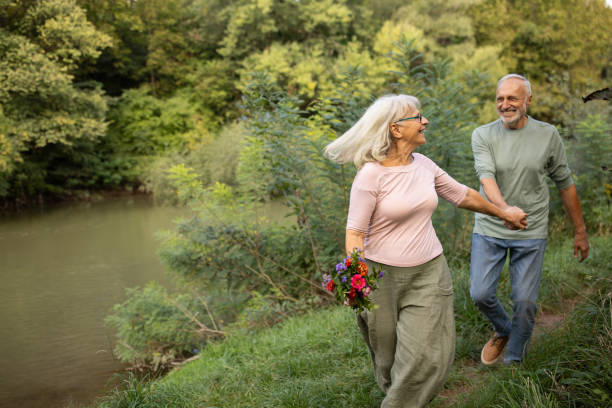 istock Happy Elderly Couple in Nature 2159591177