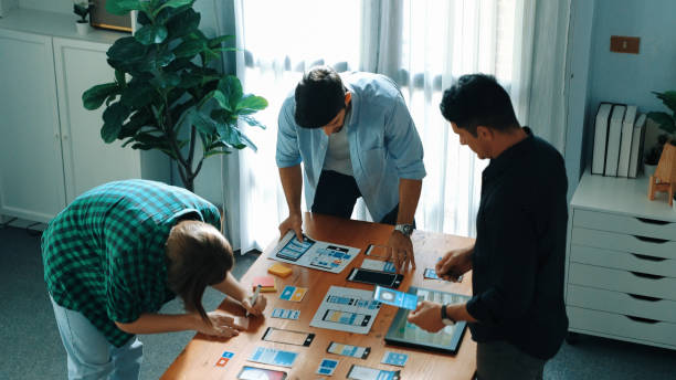istock Top view of skilled Ui designer brainstorming about Ux Uo design. Convocation. 2159592495