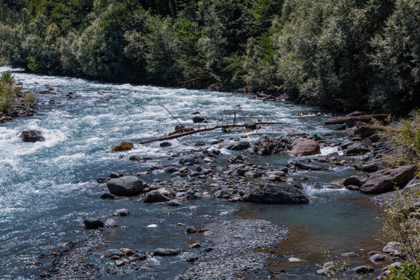 istock Streams of water from a mountain river, pouring, bubbling and waves 2159592542