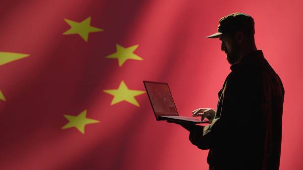 istock Chinese air defense operator using radar system on laptop to detect missiles 2159593331