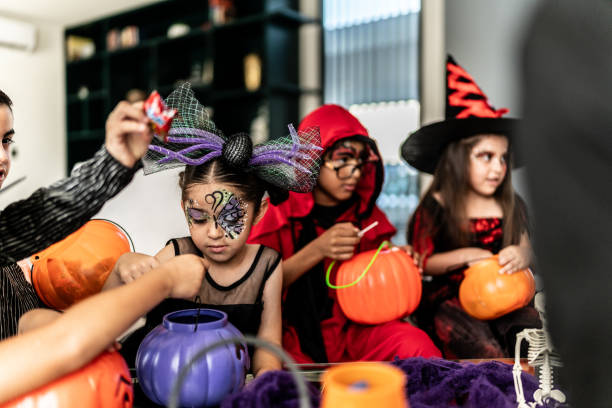 istock Children talking after picking up candy on Halloween 2159593910