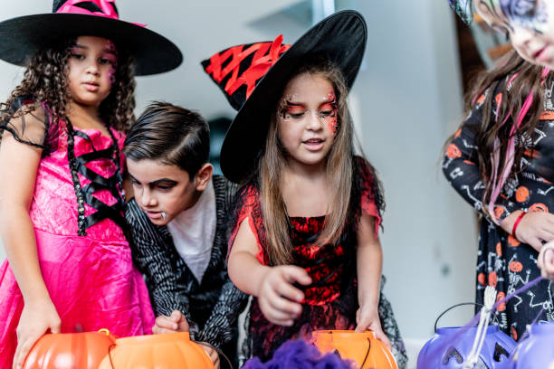 istock Children talking after picking up candy on Halloween 2159594058