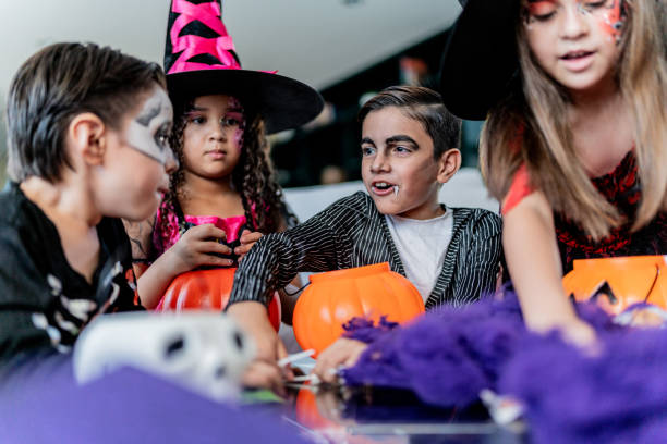 istock Children talking after picking up candy on Halloween 2159594083
