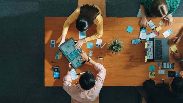 istock Top view of developer and designer shake hand together at meeting. Convocation. 2159595285