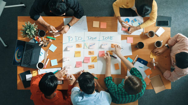 istock Top view of business team making scrum task board at meeting room. Convocation. 2159595498
