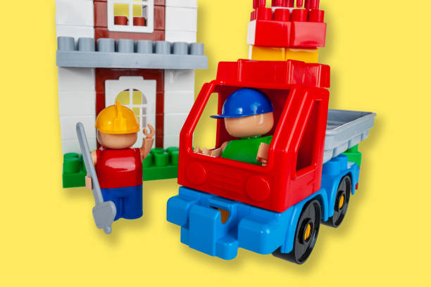 istock toy construction constructor made of parts and blocks isolated on a yellow background 2159595792