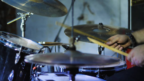 istock A musician passionately playing a drum kit, creating rhythmic beats and sounds 2159601561