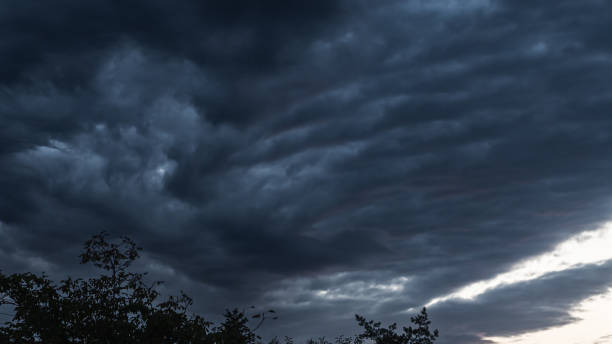 istock The sky is filled with dark clouds, indicating approaching rain or a recent downpour 2159602992