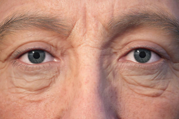 istock 3D illustration of an elderly man's eyes. 2159604448