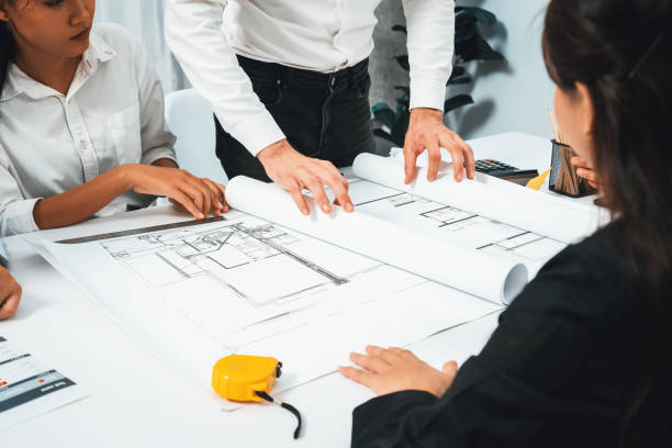 istock Diverse group of civil engineer and client working on architect. Prudent 2159608395
