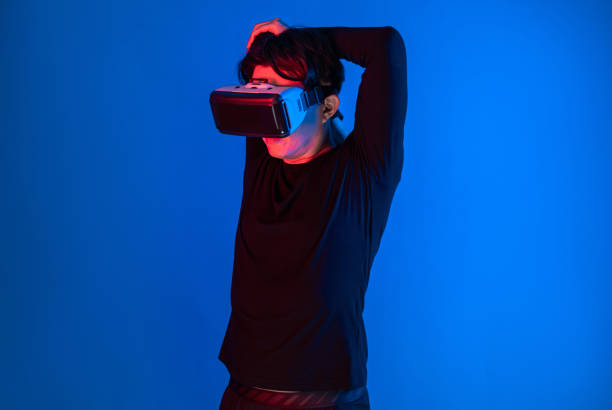 istock Smart sportman player wearing VR stretching whole body posing. Contrivance. 2159611158