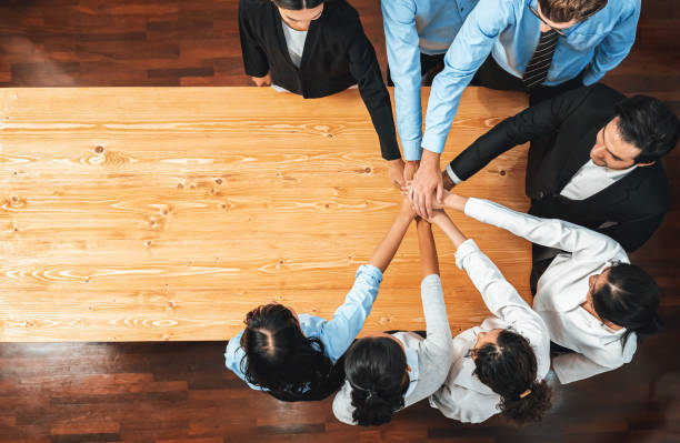 istock Multiracial business people make synergy hand stack together. Habiliment 2159611705