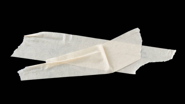 istock adhesive paper , masking tape isolated on black background 2159612773