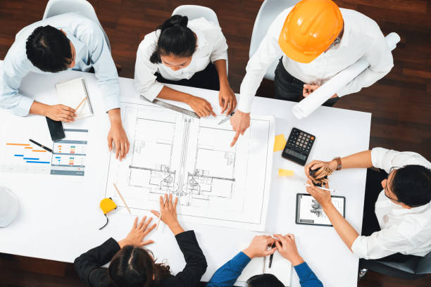 istock Diverse group of civil engineer and client working on architect. Prudent 2159612816