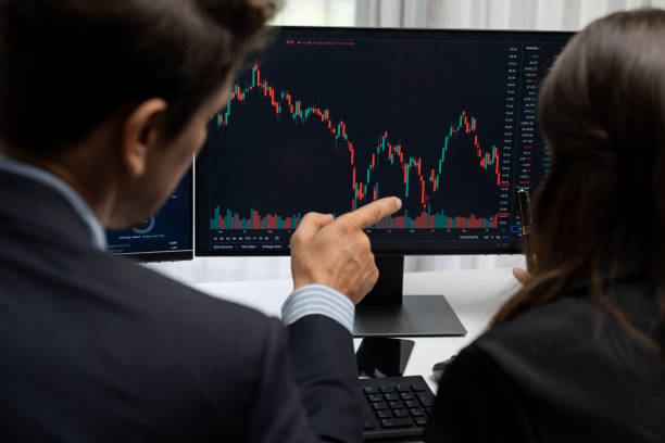 istock Business traders discussing on dynamic stock risk or profit point. Postulate. 2159614461