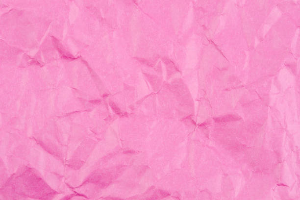 istock Crumpled textured pink background with blank space 2159614727