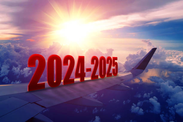 istock Airplane wing flying at sunrise in 2024-2025 2159616363