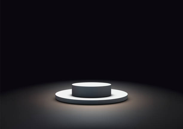 istock Spotlight Illuminated White Podium for Product Display, Mockup, and Showcase in Dark Room Background, Elegant and Modern Design Template for Exhibition 2159624477