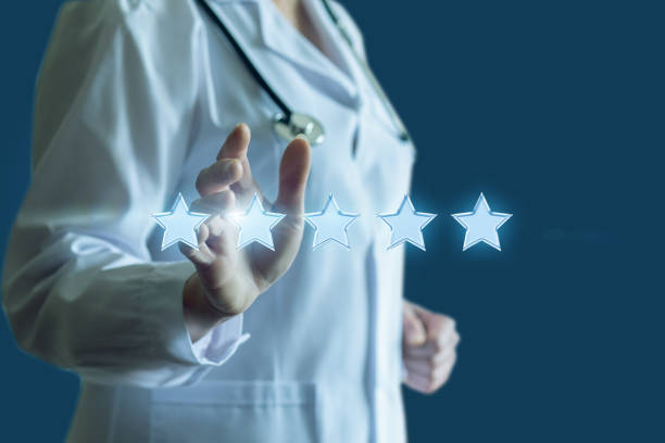 istock Doctor showing five star rating . 2159625105